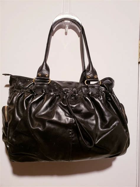 45 shipping. . Francesco biasia black leather purse